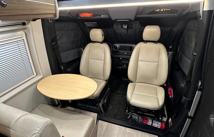 Dinette with both seats swiveled around.