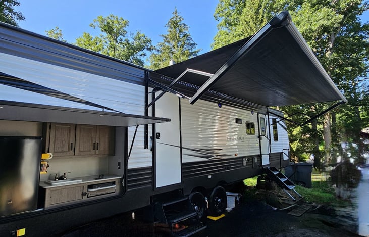 enjoy hanging out by the outdoor kitchen