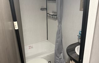 Camp w/Puma Thurman, a charming  Heartland Prowler