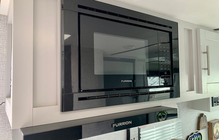 Microwave. Only works when you are plugged into electricity