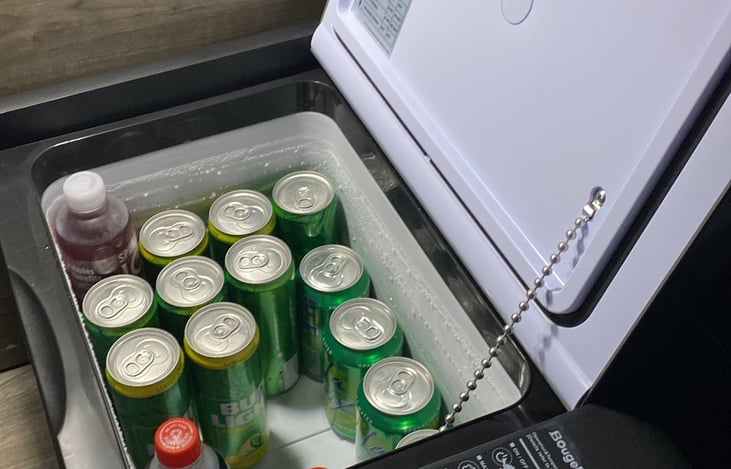 brand new 12 v / 110 v fridge for your convenience. can remain running while travelling.