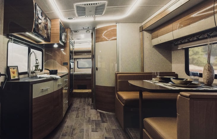 Interior dining table & cooking area  (interior slide opens up dining area)