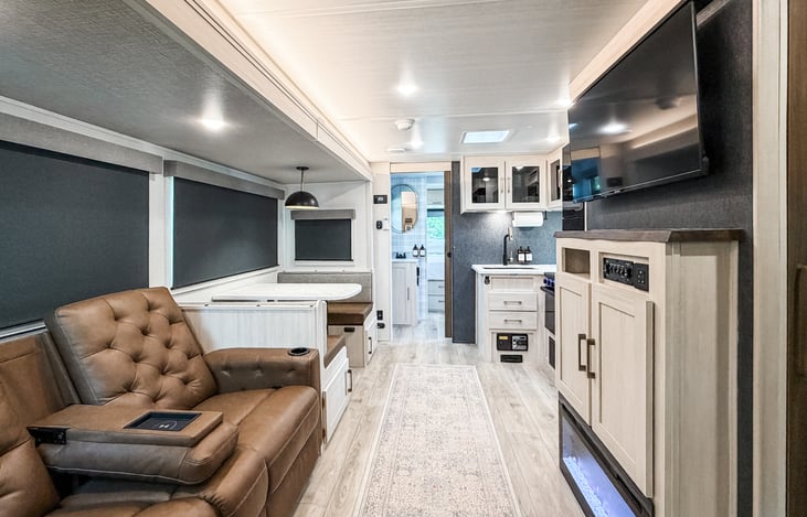 Common area includes living space, dining, and kitchen.