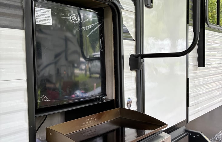 outdoor kitchen. Griddle and mini fridge