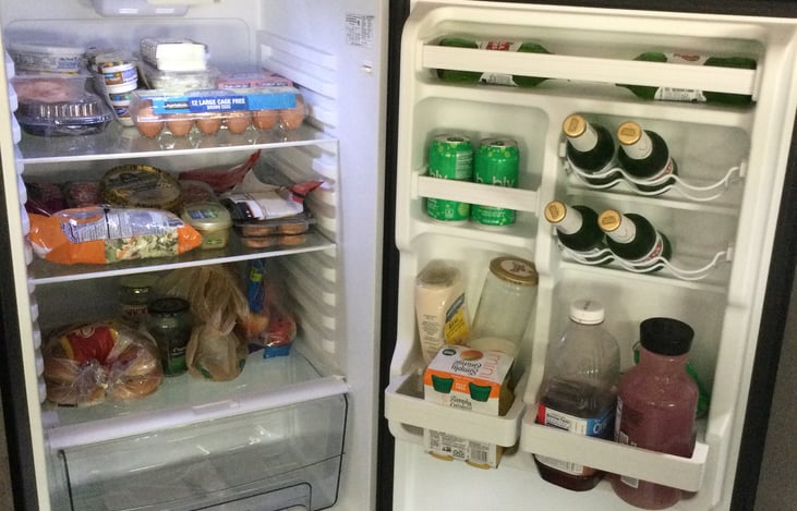 You can see that our 12V fridge can hold a lot of food, beer, etc.  Freezer is on top and holds 4 bags of ice.