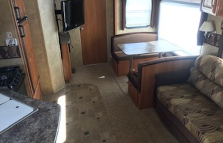 Both Kitchen Table and Couch make out to a bed