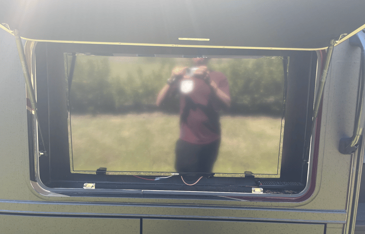 Outdoor TV and awning.