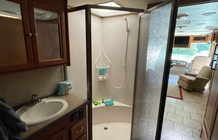Spacious shower and vanity area is separate from the toilet area
