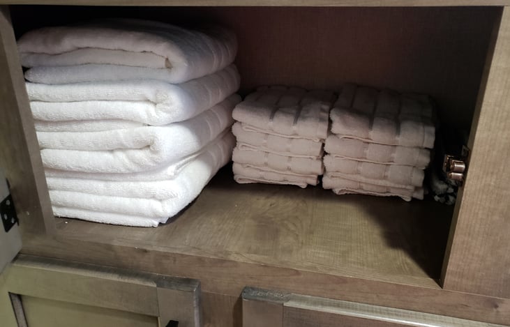 The travel trailer is comes stocked w/ towels