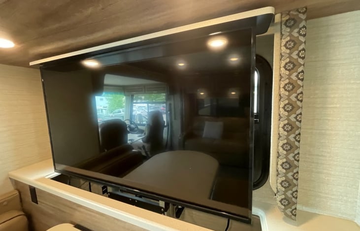 Hide-Away TV by the kitchen table.