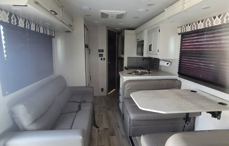 Interior with slide out retracted - Access to back bedroom through bathroom