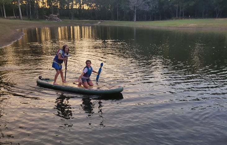 Green inflatable paddleboard