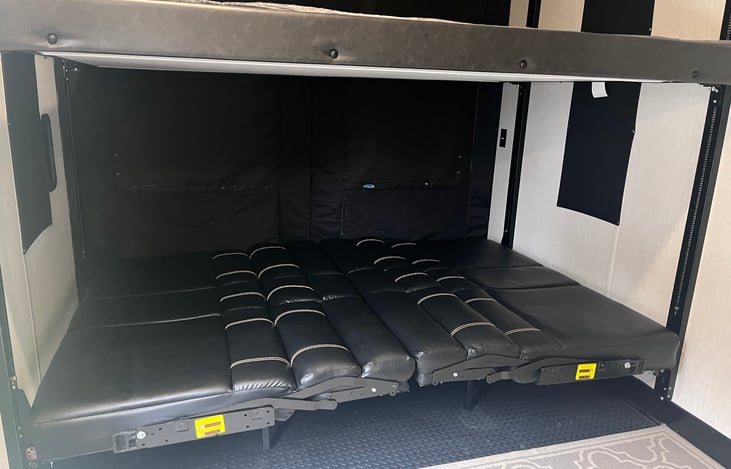 Couch converted to a king size bed (width wise).