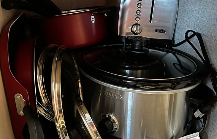 Crock pot with a little dipper crockette, 2 slice toaster and pots and pans!