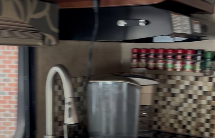 Sink , stove top , Keurig, spices