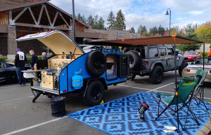 Awning and camping rug along with camp chairs make your adventure that much more comfortable!