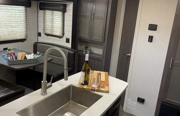 Dining room looking at front bath and master