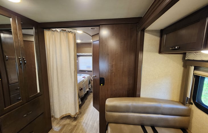 Choice of a curtain to surround the master bed and/or a pocket door for entire room separation.