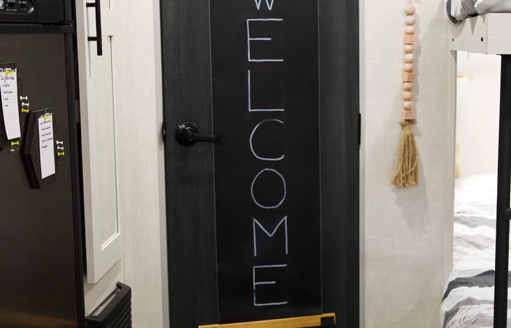 Kids love to draw on the blackboard(Chalk available), over the door hanging hooks to keep stuff off the floor. Spacious pantry with baskets. Look for boardgames/cards/puzzles/books etc. in there too.