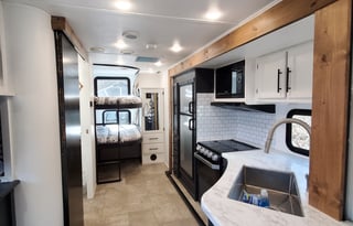 The Happy Camper | Bunks & Upgraded Queen Mattress