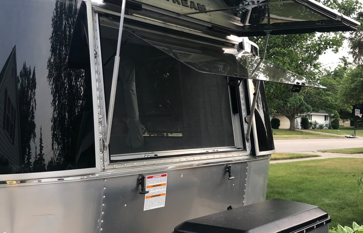 Dual-paned windows provide interior shade. Excellent breeze when open.