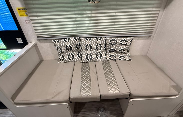 Dinette folded down into an additional sleeping area.