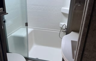 Spacious, stocked, delivered. King w/ pullout sofa