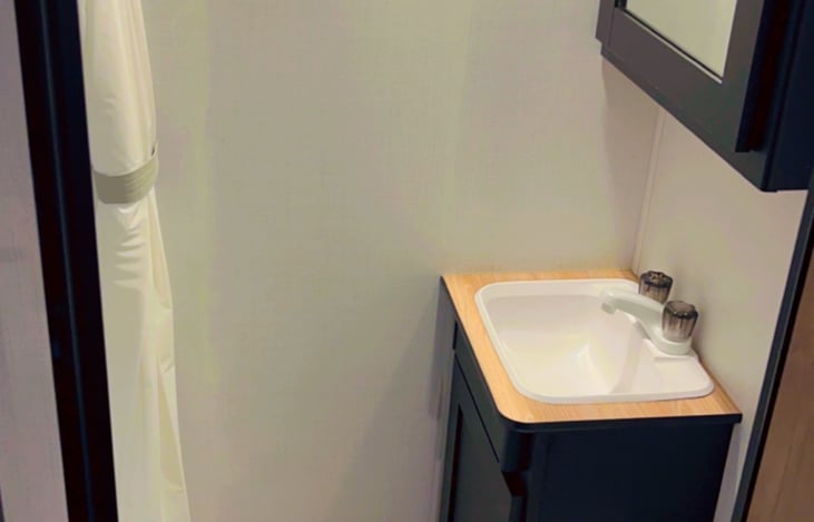 Bathroom sink and medicine cabinet