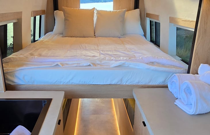 Cozy beds.  Top bed is hydraulic and drops from the ceiling.  Bottom bed converts from the couches.