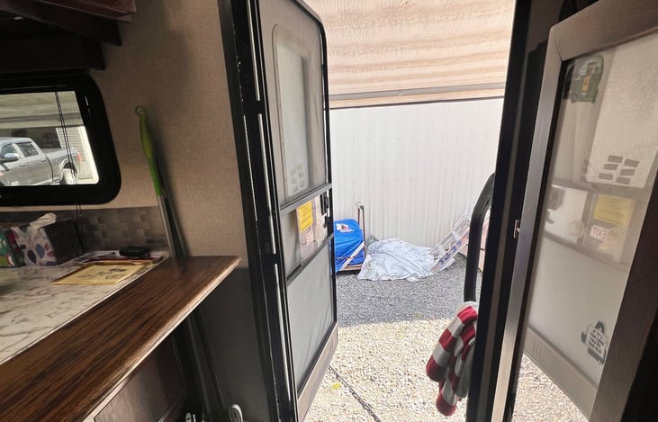 Screendoors at both entryways for air flow.