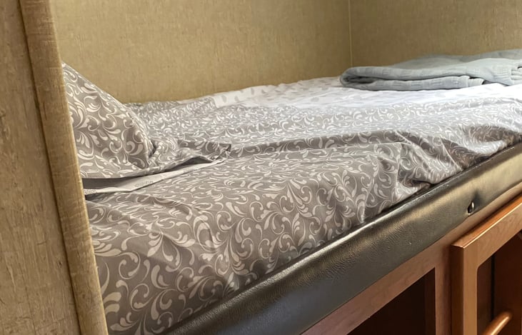 Full size bed with closet down below