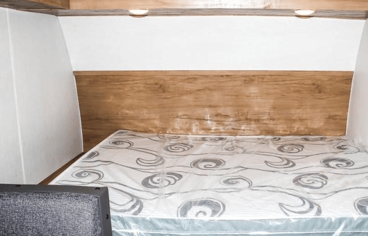 Master Bed  
(Replacing sheets and bedding between guests  :)