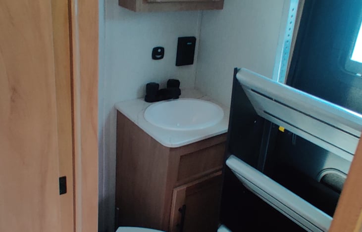 Half bathroom. Easily accessible from outside and inside