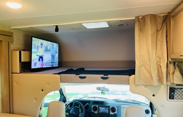 Full Size Bed above Cab