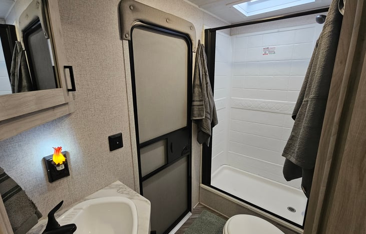 Bathroom. Towels, shampoo, conditioner, and body wash are provided