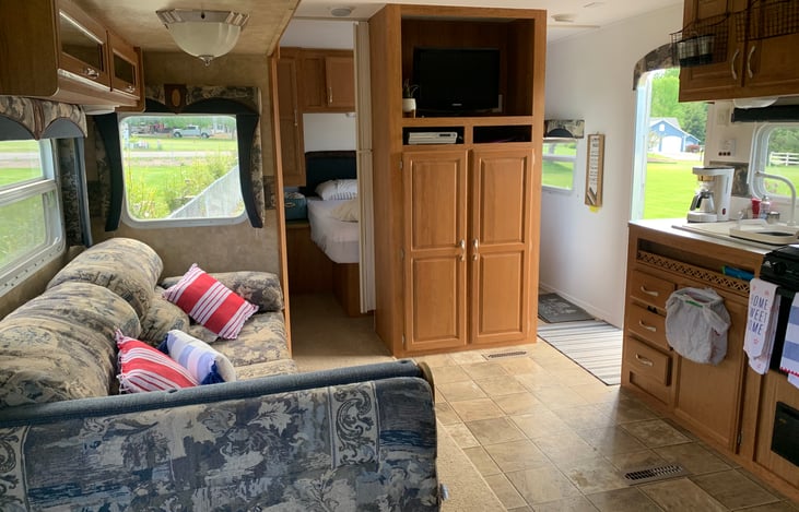 Access the Queen bed from either side of the bed. There are privacy curtains on both sides also.