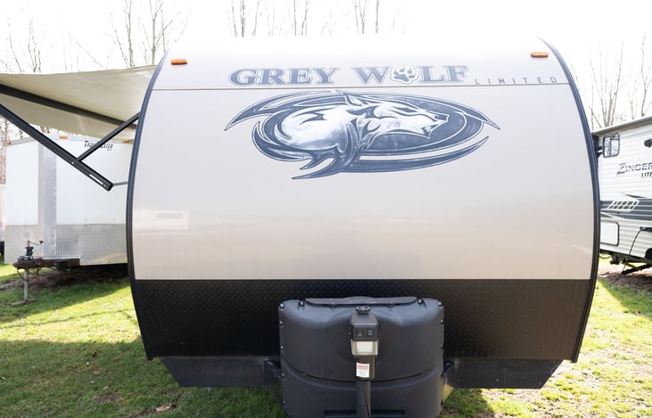 Power Tongue Jack with covered propane tanks