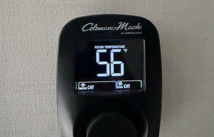 Single dial for heat and AC.