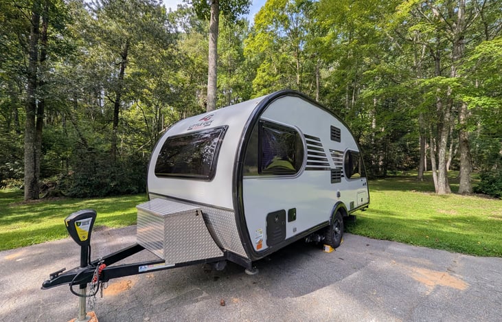 Rugged, cozy and classy, this easy-to-tow 2021 Little Guy Max is loaded with features and accommodations including Rough Rider package, solar, solid wood cabinetry, Queen bed, pop-out windows & more.