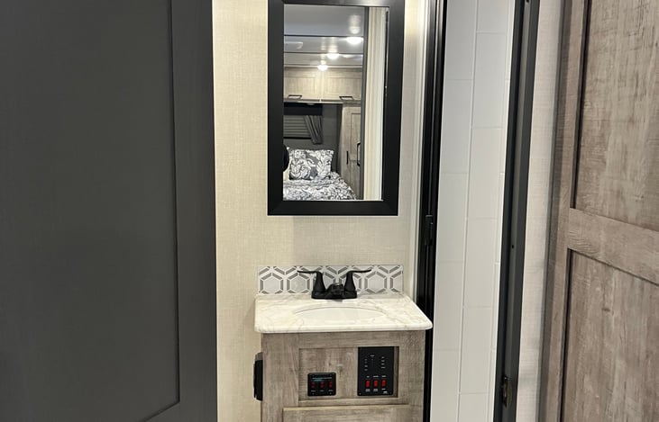 Large bathroom with full size shower.