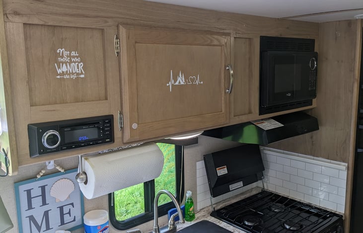 AM/FM radio with speakers in and outdoors