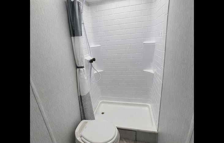 Bathroom with a large shower.