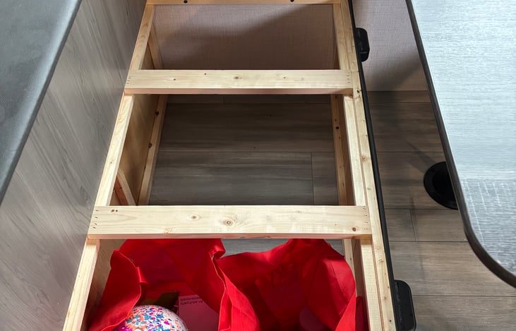 Plenty of storage for anything you need. We have a couple small toys for the kids