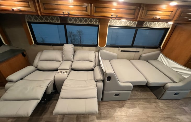 Dinette folded into bed and chairs reclined