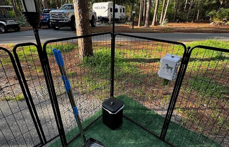 Paws and Play Package includes pet waste station, waste bags, waste scoop, pet fencing