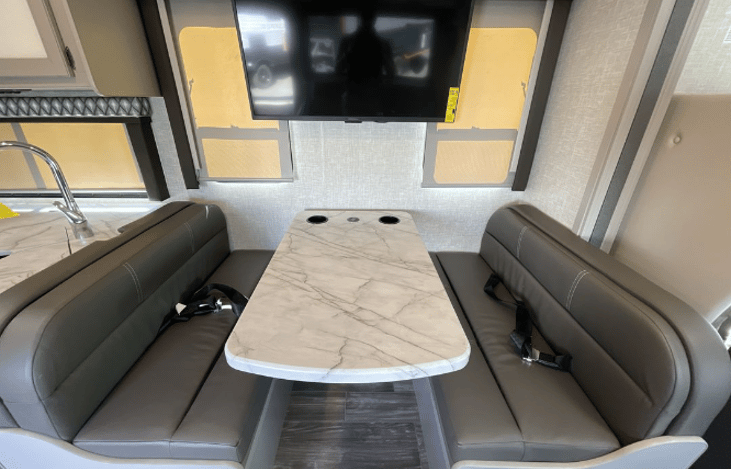 Dinette folds to a large sleeping bed for 2