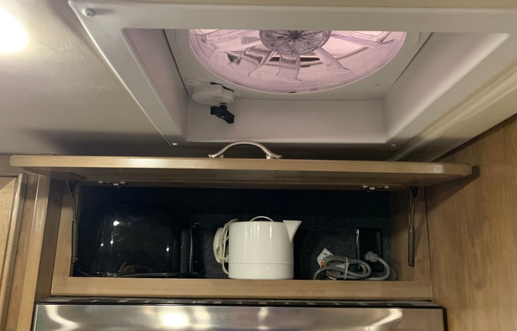 Toaster & storage over microwave. Kitchen ceiling fan