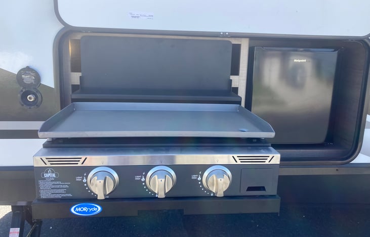 Outdoor grill and mini fridge