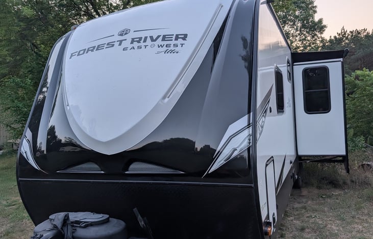 This single slide-out doubles all the fun spaces for the couch and dining area. The heated underbelly and central air makes this a perfect 4-season camper.