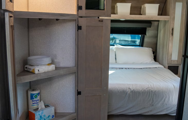 a floor to ceiling pantry offers plenty of room for all of your food and dining essentials.